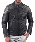 Men’s black leather jacket with skull and crossbones design and front zip closure

