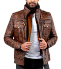 Men’s vintage biker leather jacket in distressed black with classic moto style

